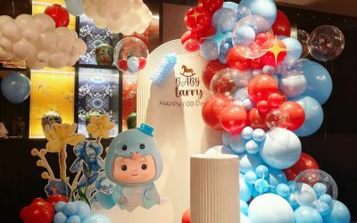 A Playful Red and Blue Balloon Installation with Cloud Balloon Styling