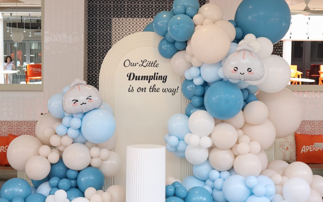 A Playful Blue Balloon Installation with Dumpling-Themed Details