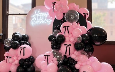 Stunning Black and Pink Birthday Balloon Decoration with Elegant Bow Accents