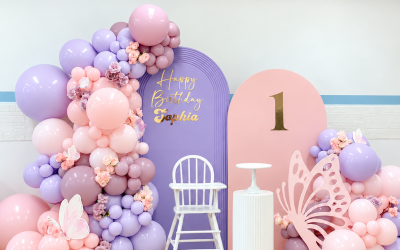 Dreamy Pink and Purple Butterfly Balloon Decoration with Floral Accents